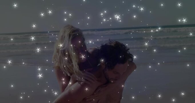 Woman stepping onto man back, man securing hold, star overlay hiding faces, couple walking leisure