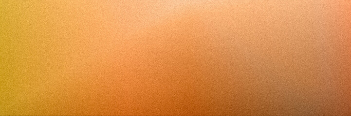 Naklejka premium Grainy abstract panorama. Rich golden and orange hues blend with fine grain texture, creating a cozy, energetic abstract background ideal for autumn campaigns, invitations, and bold digital layouts.