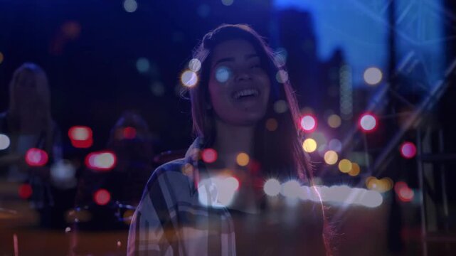 Woman smiling, laughing, settling after friend's joke in street, bokeh drifting on face marketing