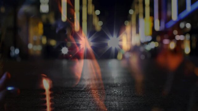 Female singer singing into mic, oncoming headlights causing face overlay and flares for music promo