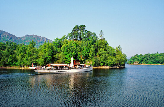 Vintage steam passenger boat Sir Walter Scott on Loch Katrine in the Central Region of Scotland, UK