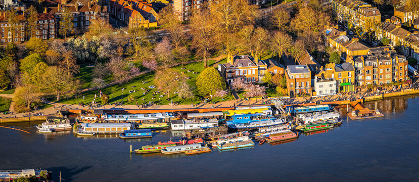 Houseboats Moored on River Thames in Hammersmith London Waterfront Scene