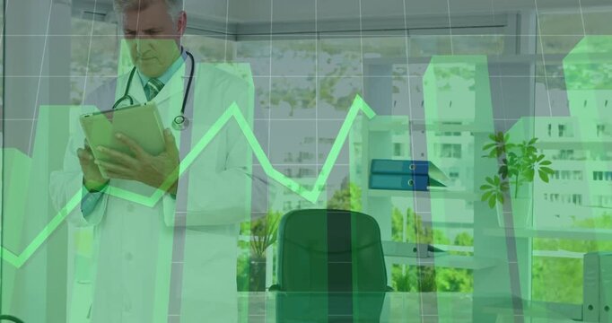 Doctor tapping tablet in medical office, monitoring finances as green bar and line charts rising