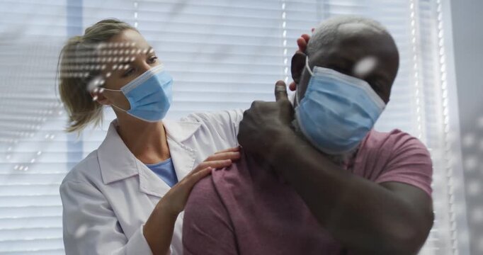 PT placing hands on patient initiating neck or shoulder treatment, dotted map and command text overl