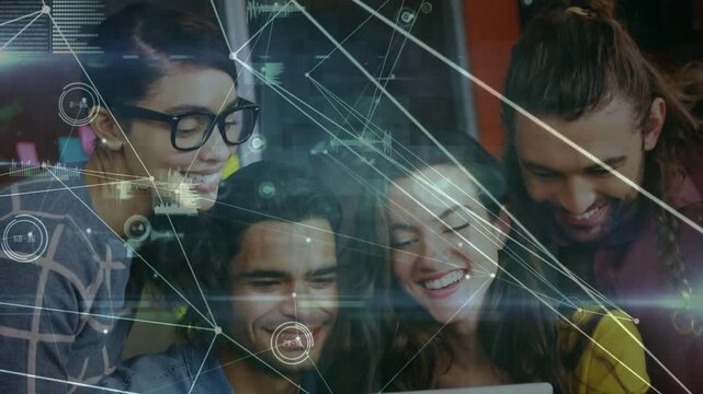 Four colleagues leaning into laptop and viewing campaign results, HUD lines shifting across screen