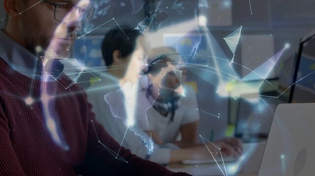 Man typing on laptop initiating tech nodes growing into rotating globe over palm enabling teamwork