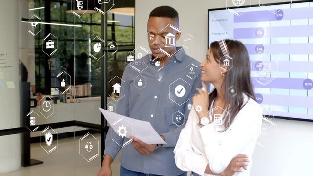 Man reading report and woman gesturing in business, hex icons overlaying it showing bars agreeing