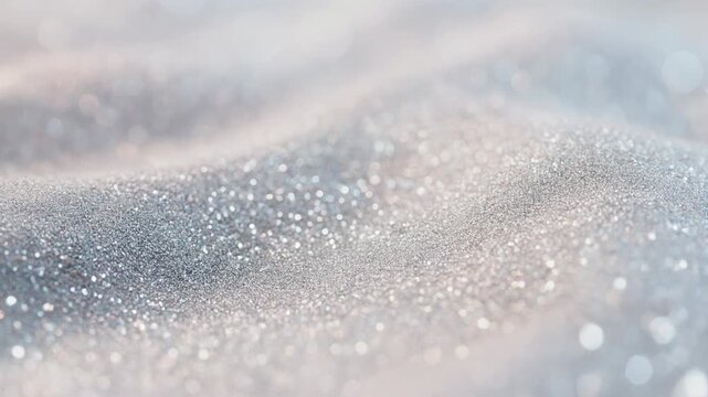 Close up of sparkling silver glitter texture with bokeh lights and soft focus background