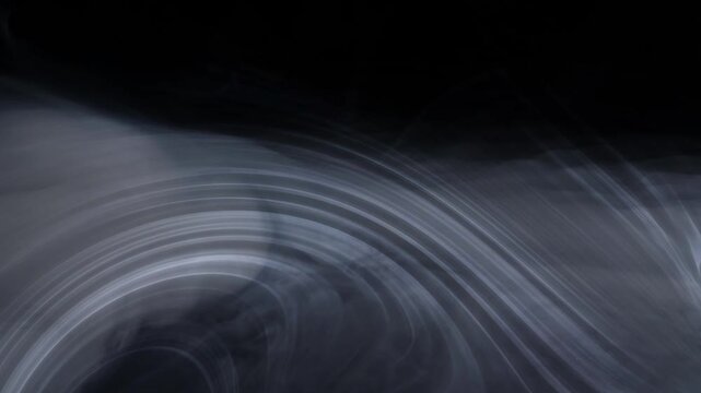 Abstract White Smoke Waves and Light Trails on Black Background.