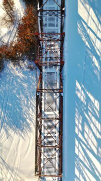 Aerial Drone Top Down View of Historic Canadian National Railway Swing Bridge Over Trent Severn Waterway in Frankford Ontario Canada