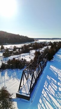 Aerial Drone View of Historic Canadian National Railway Swing Bridge Over Trent Severn Waterway in Frankford Ontario Canada