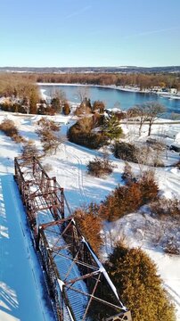 Aerial Drone View of Historic Canadian National Railway Swing Bridge Over Trent Severn Waterway in Frankford Ontario Canada