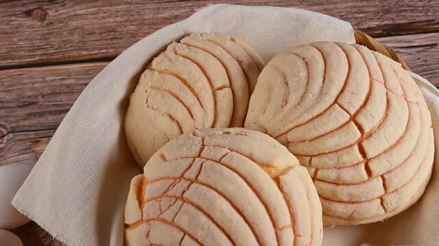 Conchas bread, authentic Mexican bakery pastry, pan de dulce on a rustic background