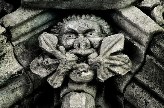 Carved stone Green Man ceiling detail in 15th C. Chapter House at Glenluce Abbey, Dumfries and Galloway region, Scotland UK