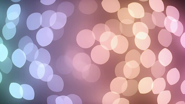 Abstract bokeh background with gradient colors of teal, purple, pink, and yellow. Glowing blurred shapes
