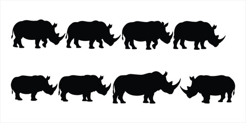 Collection of black rhinoceros silhouettes in various poses animal wildlife © Mst