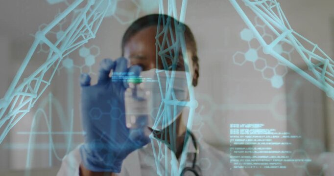 Gloved hand presenting vial woman MD inspecting rotating as DNA overlays verifying COVID-19 label