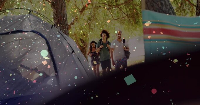 Group of friends entering trees, causing confetti overlay while walking into camp toward tent