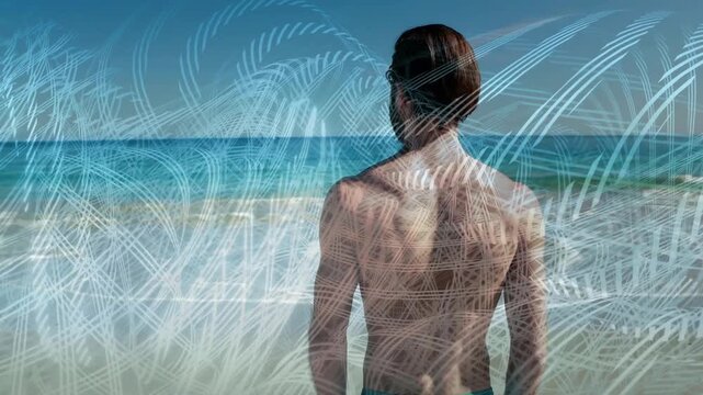 Man standing at shore teal trunks overlay sweeping causing shifts as waves roll evoking travel