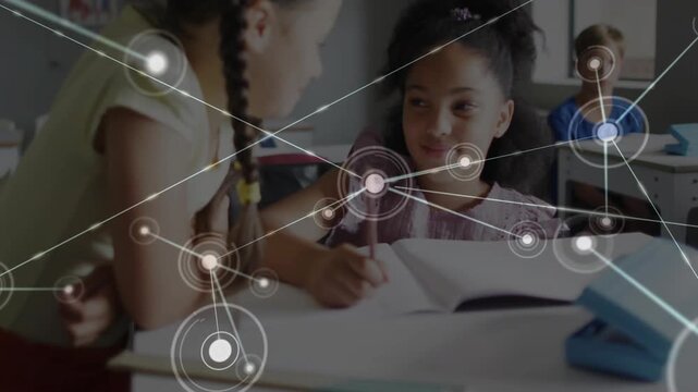 Circle graphic appearing over desk sparking node web on girls helping pencil marking note for class