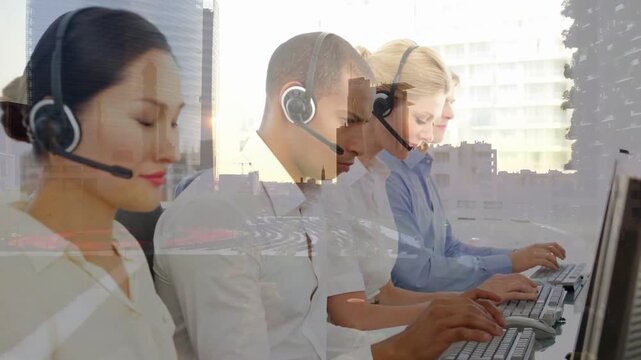 City reflection rising, four call-center agents typing and speaking, showcasing customer service