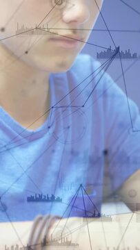 Vertical video: Teen studying, camera panning showing learning overlays on hands, sorting homework