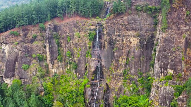 Top view of waterfall in the rainforest. Bambarakanda Falls, Sri Lanka.