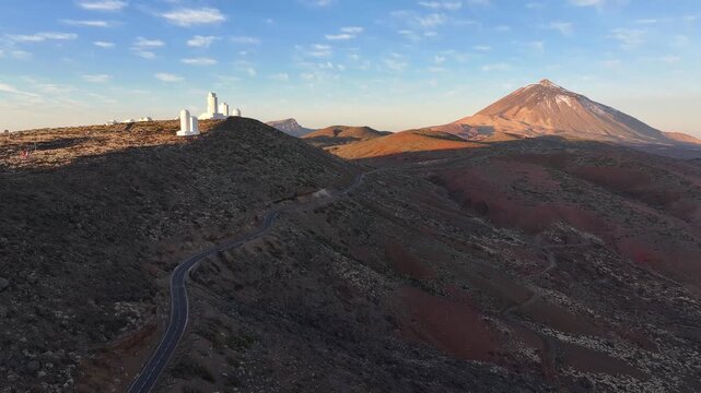 The TF-24 road runs past the Teide Observatory in Teide National Park. Tenerife. Canary islands. Aerial video.