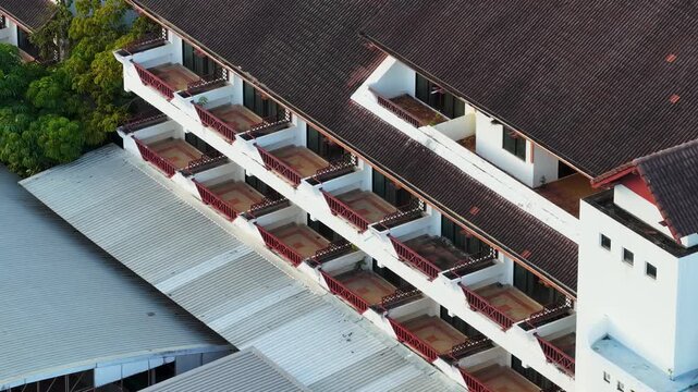 Aerial View of Abandoned Hotel Resort with Brown Roof Tiles in Thailand