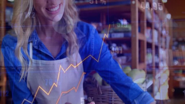 Vendor shifting Organic sign, adjusting carrots as charts overlaying board and face, showing sales