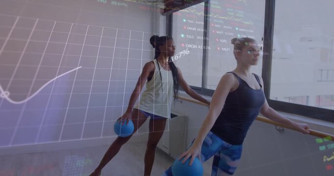 Two women starting fitness barre balancing blue balls while data graphs rising over arms for tone