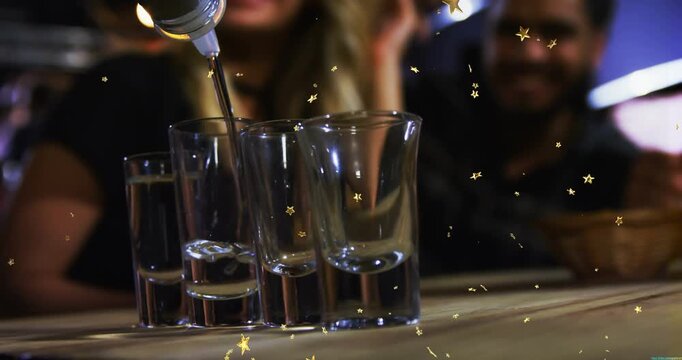 Bottle entering left, pouring into 4 shots at bar, shifting stream, star overlay, couple toasting