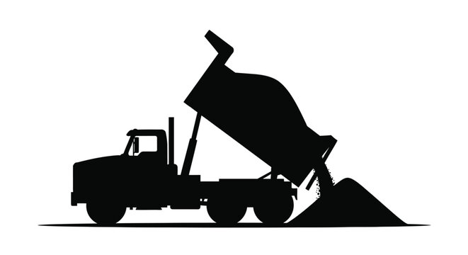 Dump truck unloading materials a striking black silhouette