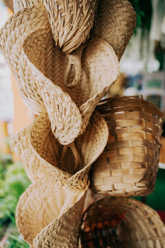 Handcrafted Woven Bamboo Fans and Baskets, Traditional Filipino Native Crafts and Souvenirs in Natural Fiber
