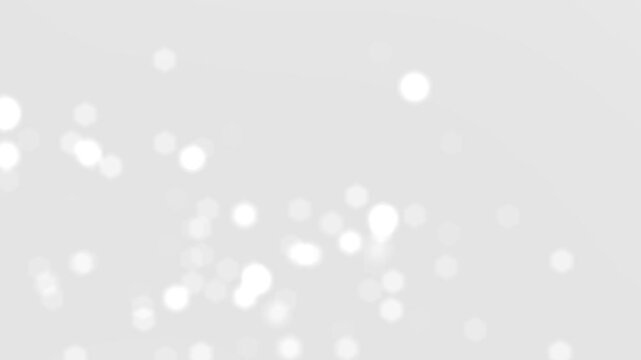 Elegant silver gradient with sparkling bokeh overlay suitable for corporate branding, invitations, and celebration visuals.