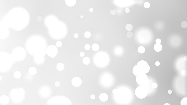 White and silver gradient background with soft bokeh light overlay creating an elegant and luxurious abstract backdrop.