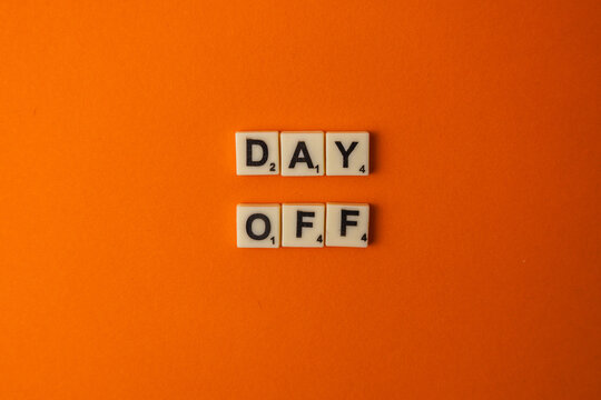 Lviv Ukraine 02.26.26 Celebration for National Scrabble Day with word tiles on orange background