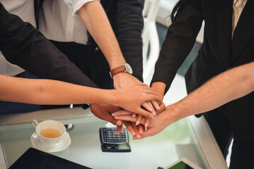 Obraz premium Banner top view business people meeting together at office desk conference room. Panorama Diversity Hands join empower partner teams connection Mergers acquisitions social community teamwork mission