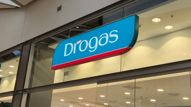 Vilnius Lithuania - 21.03.2026, drogas store sign in akropolis shopping center with illuminated brand logo on modern facade and glass storefront in retail environment