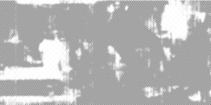 Abstract monochrome halftone texture featuring a vintage dotted pattern overlay