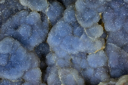 Closeup, blue druzy quartz botryoidal formation. 
