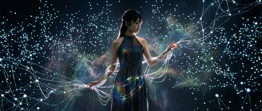 Elegant woman manipulates network of light with cinematic lighting in dreamy space