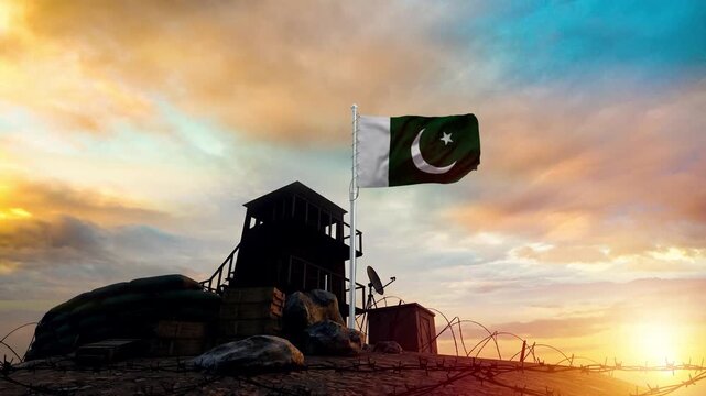 Pakistani flag waving proudly above a military outpost at sunrise video footage