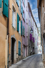 Fototapeta premium Anduze in France, old facades in the historic center, typical street 