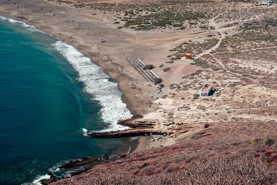 A small beach in the desert landscape hidden near El Medano