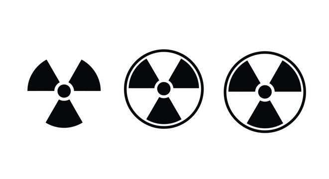 Three radioactive warning signs depicted in a stark black silhouette