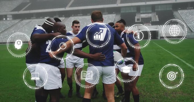 Animation of media icons over diverse male rugby team in huddle at stadium