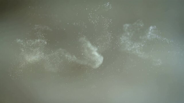 Pale-sage dust-smear overlay with loose clustered drift and staggered fading in the upper half