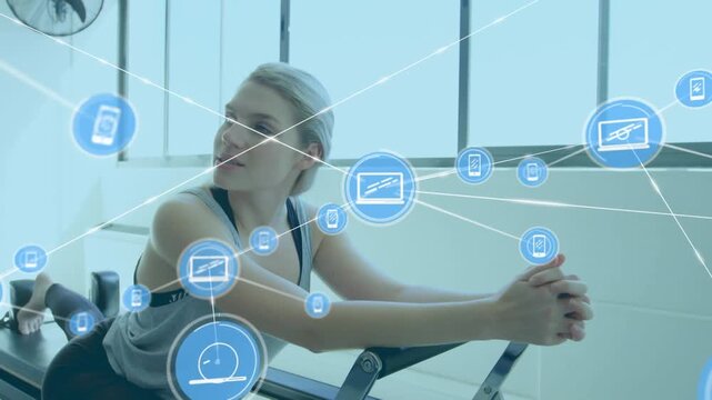 Animation of connected icons over diverse friends talking while exercising in gym