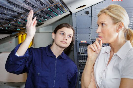 portrait of woman training a female apprentice